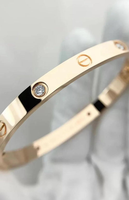 Rose gold ChicShukra imitation bracelet with diamond accents and sleek black enamel detailing.